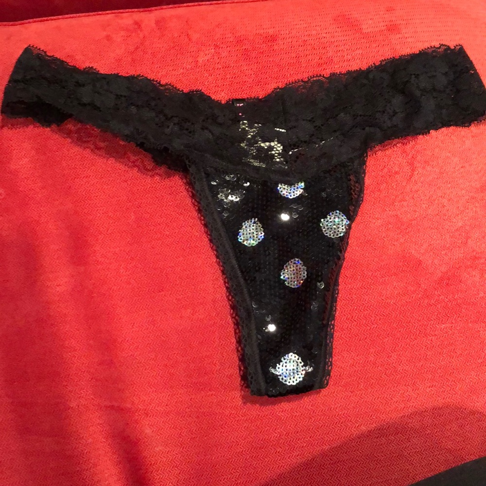 2 black thongs - one with sequins.